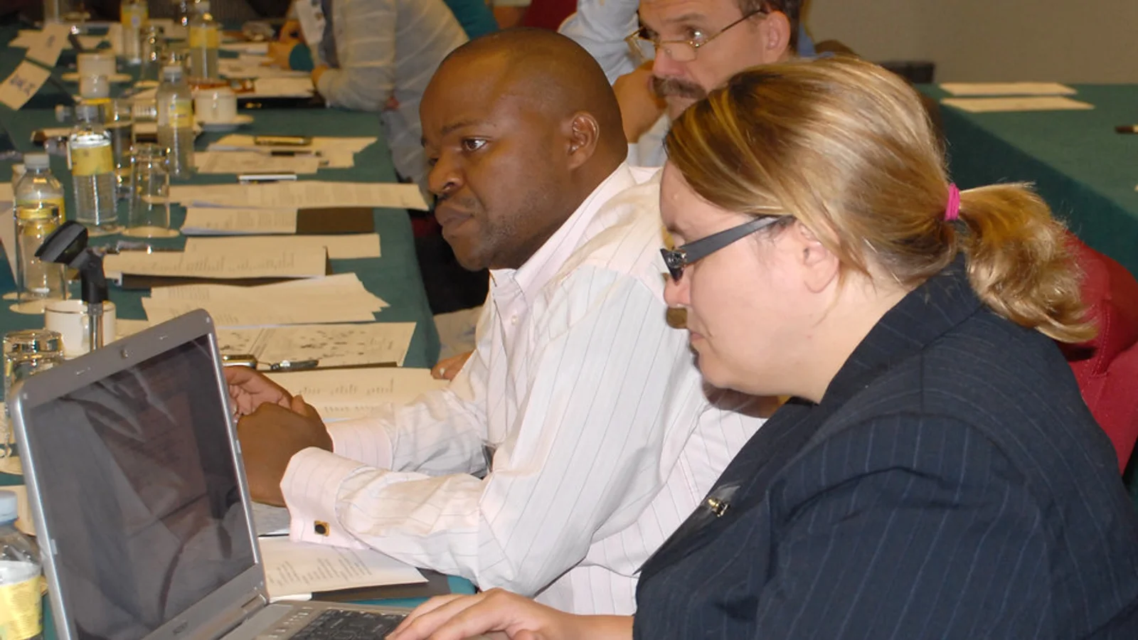 Training provider team reviewing accreditation evidence for How do I prove that my facilitators are qualified enough for accreditation?