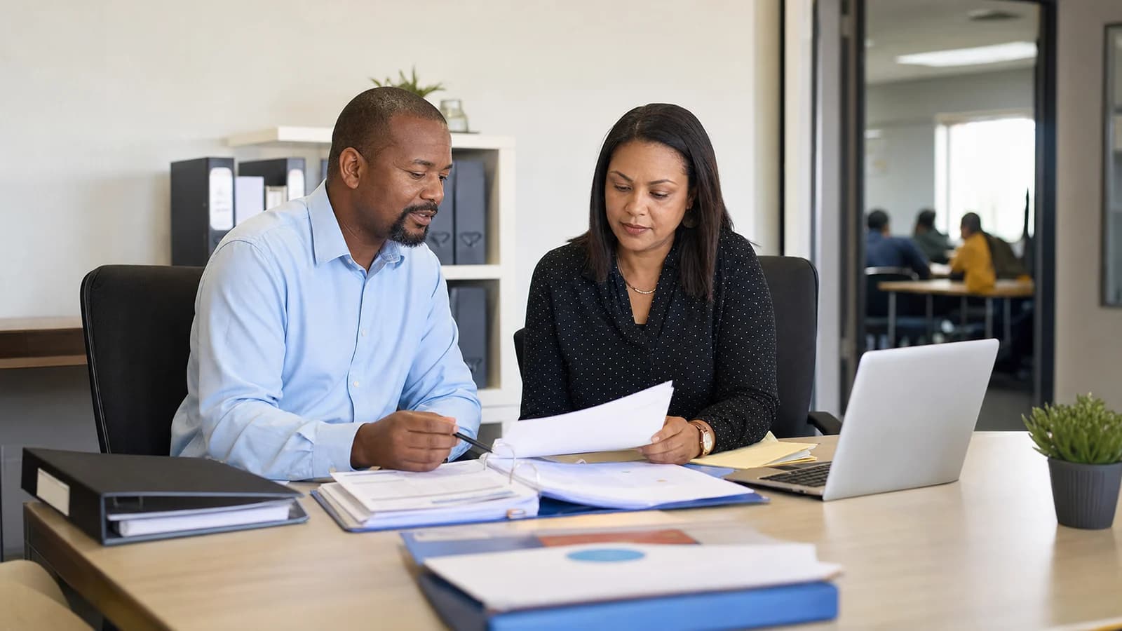 Training provider team reviewing evidence for I run a private training provider and want QCTO accreditation. What should I prepare before I apply?