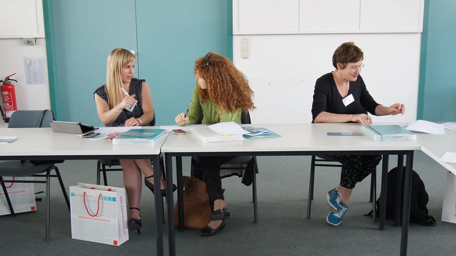 Training provider staff reviewing learner evidence for What should an assessment policy include for accreditation?